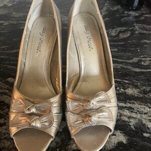 Gold open toe pumps
